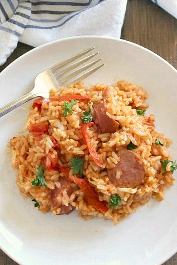 Easy Smoked Sausage and Rice Skillet is an easy, family loved, main dish packed with tons of  flavor that is ready in just 30 minutes. It’s the perfect weeknight meal when need to get dinner on the table fast.