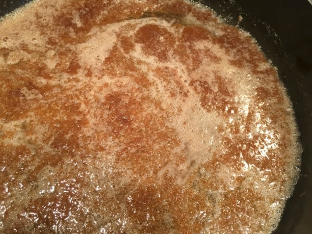 brown sugar, nutmeg, cinnamon and melted butter mixture in cast iron skillet 