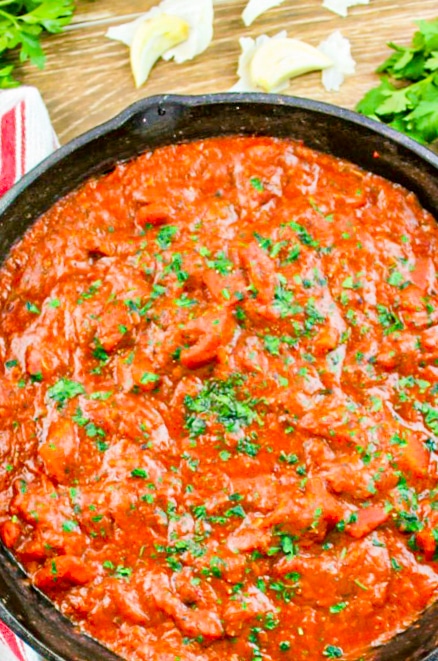 Marinara Sauce garnished with chopped parsley 