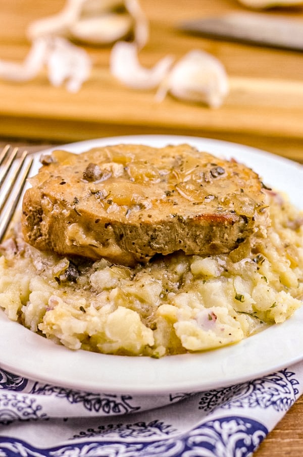 Slow Cooker Smothered Pork Chops - New South Charm