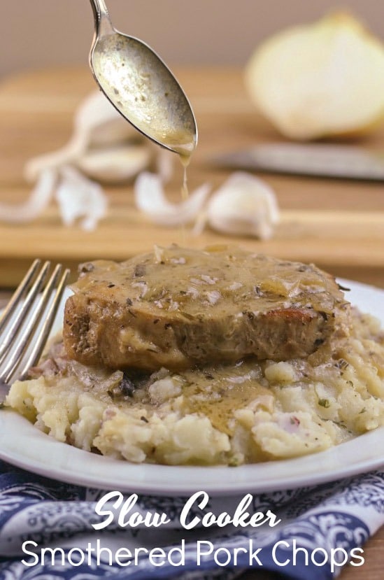 Slow Cooker Smothered Pork Chops are pure Southern comfort food. The pork chops are juicy and fork tender. Plus, they are smothered in a delicious and savory onion and garlic gravy.
