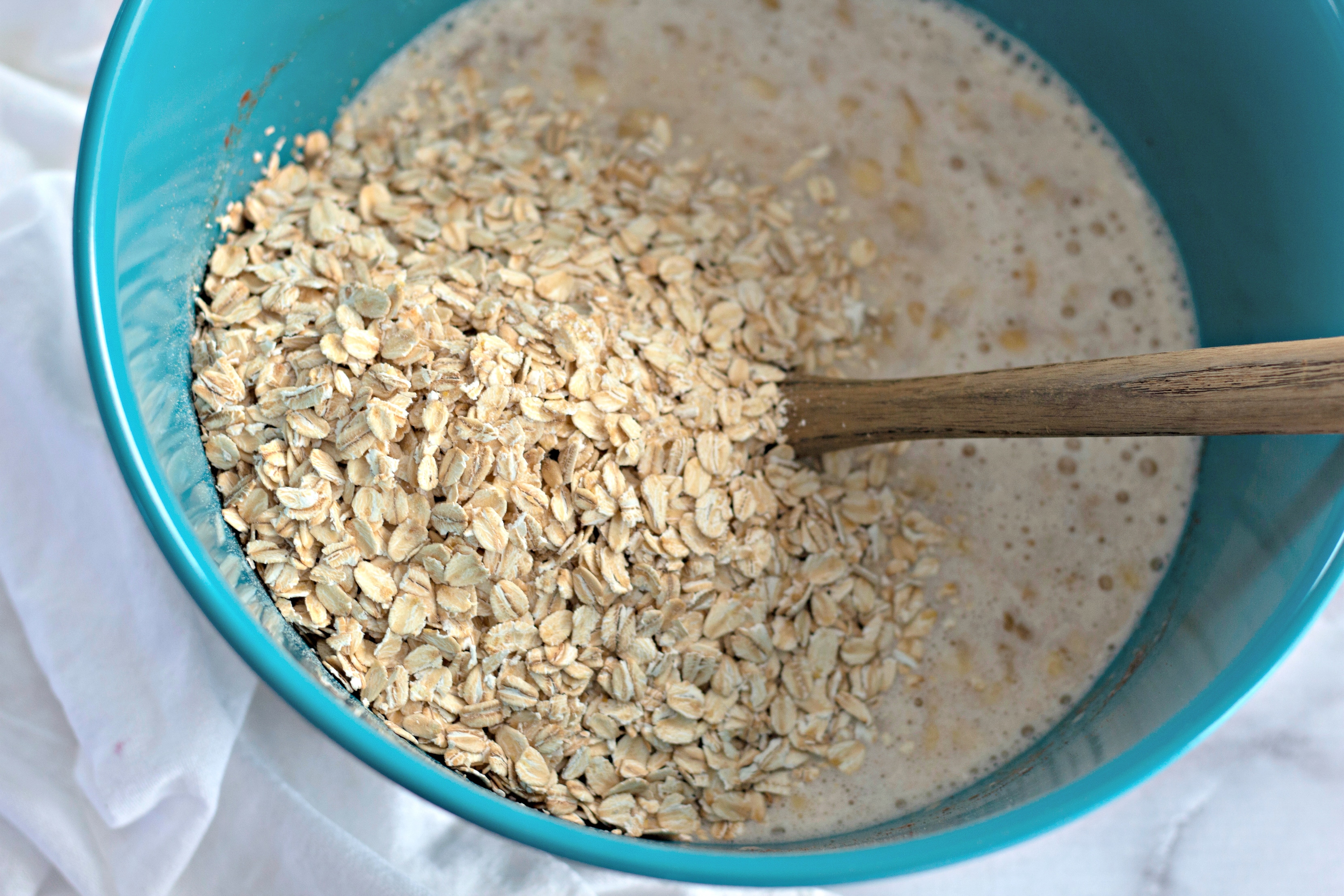 baked banana bread oatmeal step two ingredients mixed and combined with rolled oats