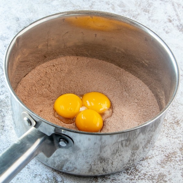 Old Fashioned Chocolate Pie step two added egg yolks to dry ingredients in stainless steel pot