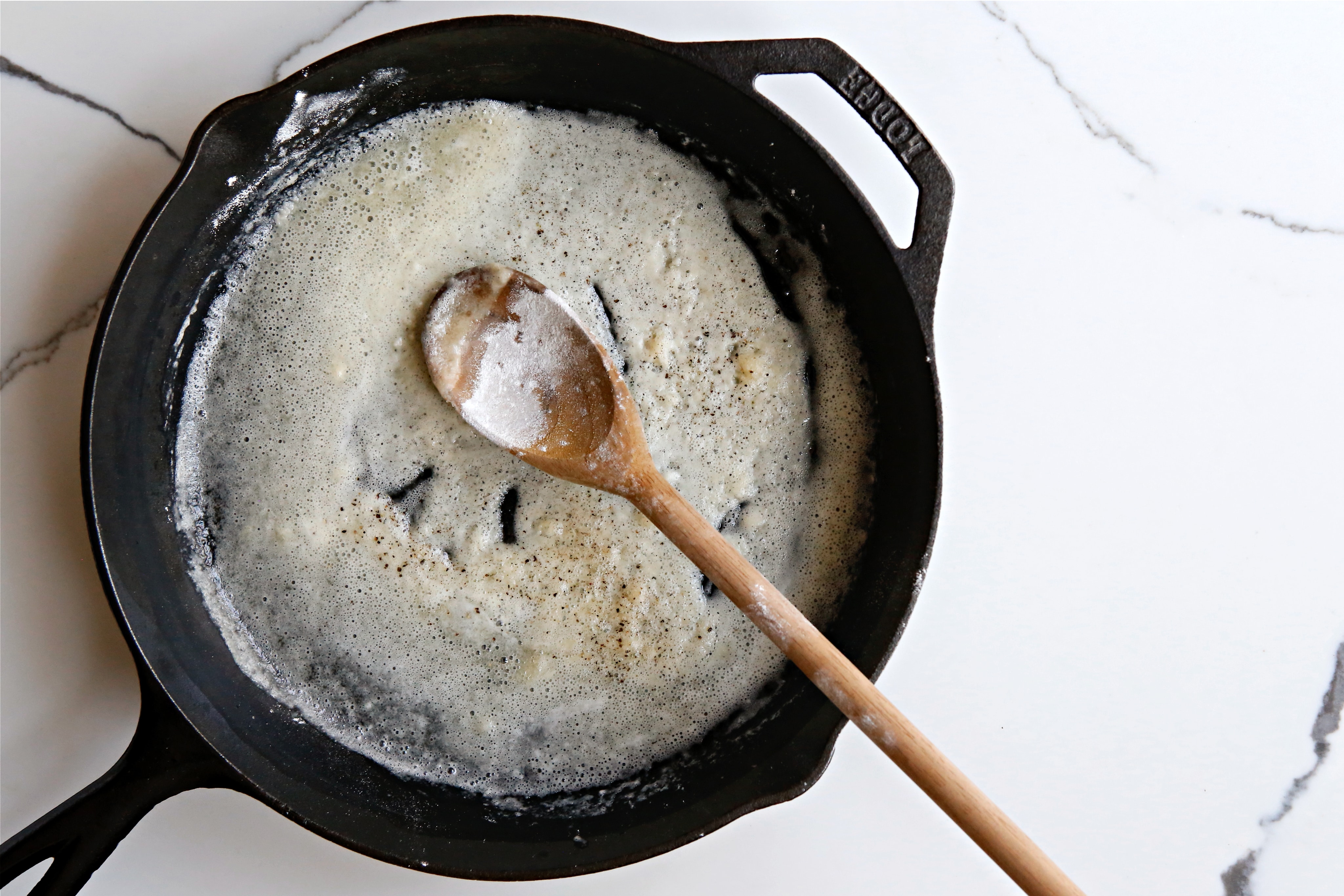 Melted butter and flour combined in a cast iron skillet