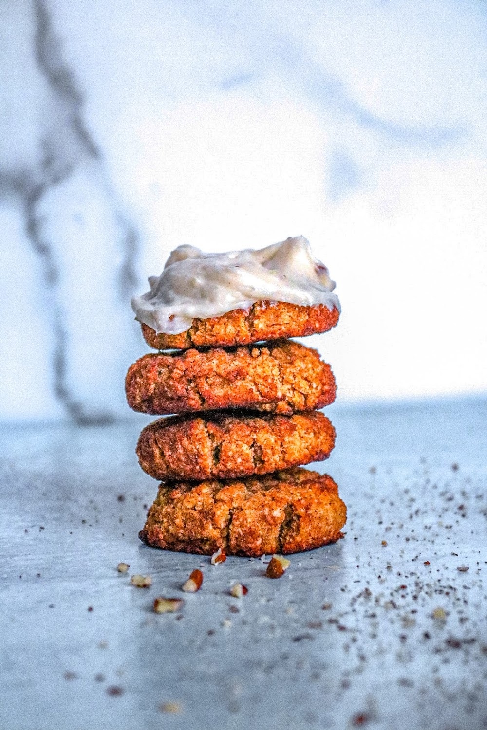 Pumpkin Snickerdoodle cookies in a stack on white background