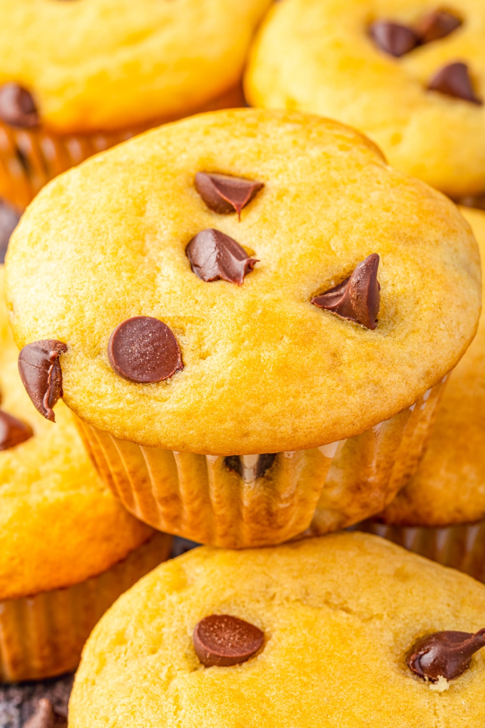 A close up photo of pancake mix muffins with chocolate chips.