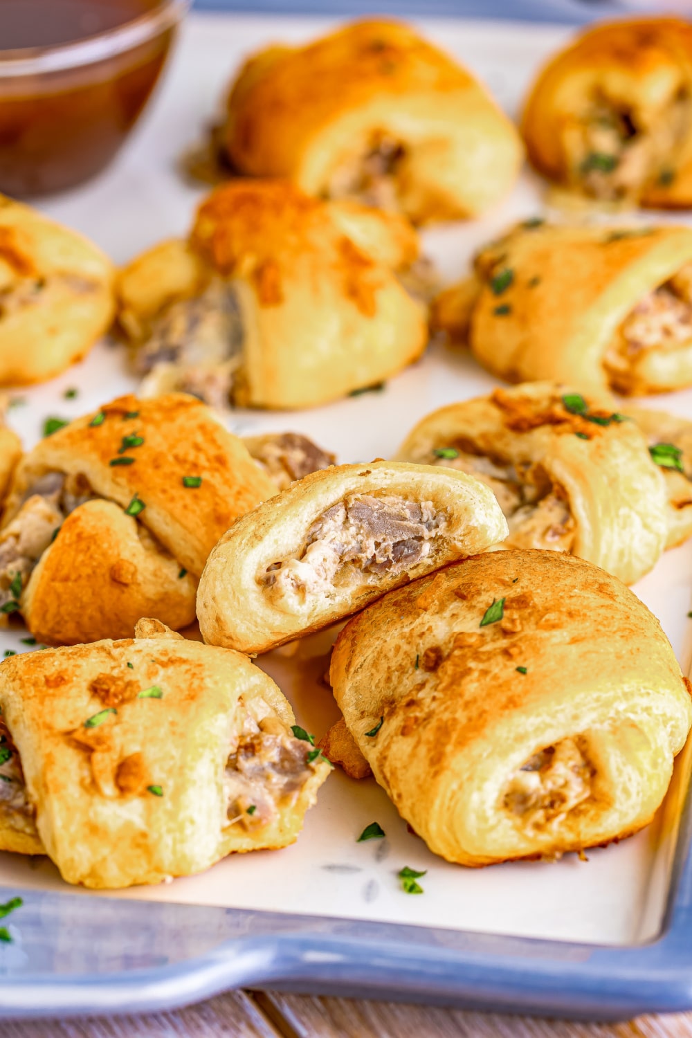 French Dip Crescent rolls on a baking sheet.