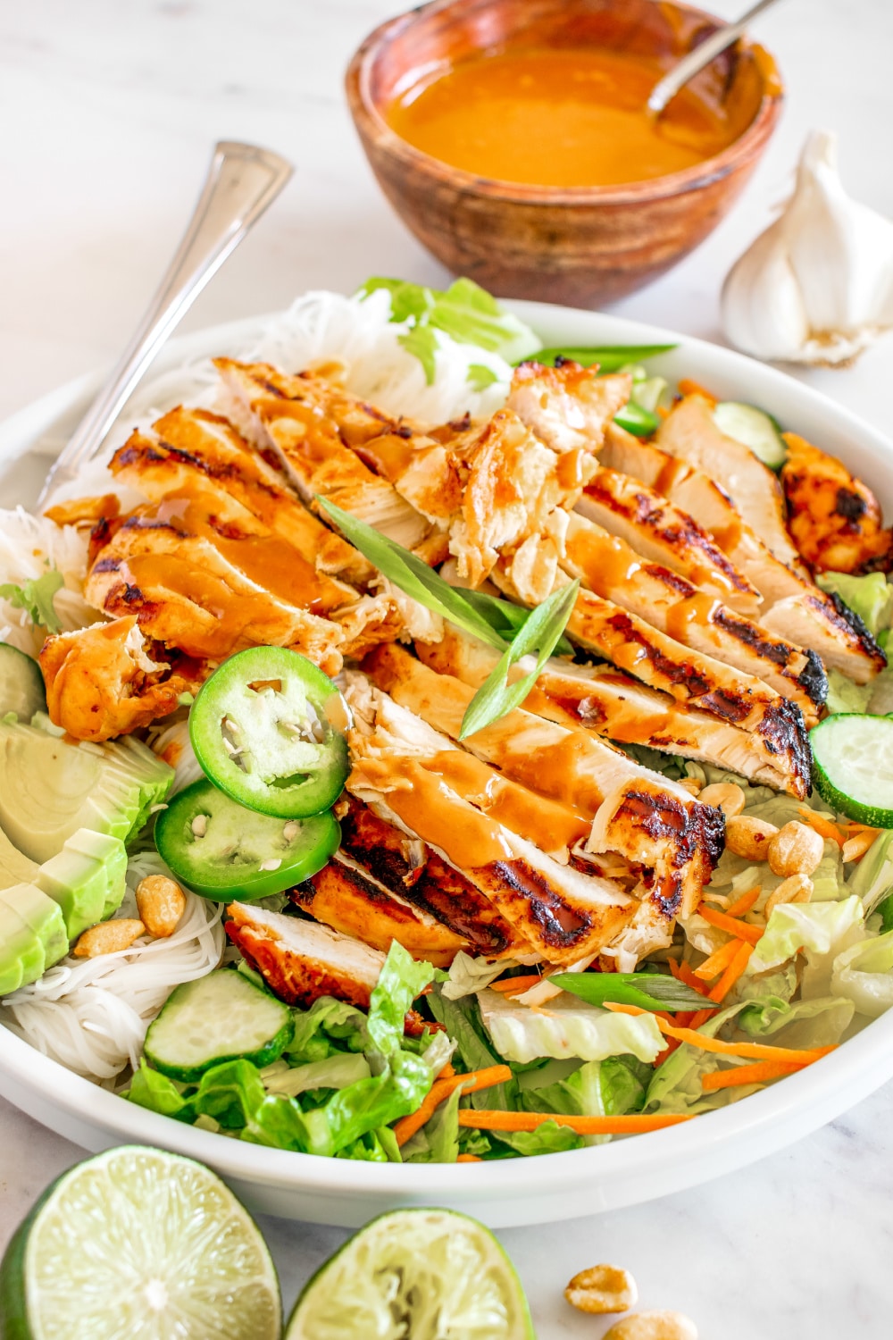 Spring Roll Chicken Salad in a white bowl.