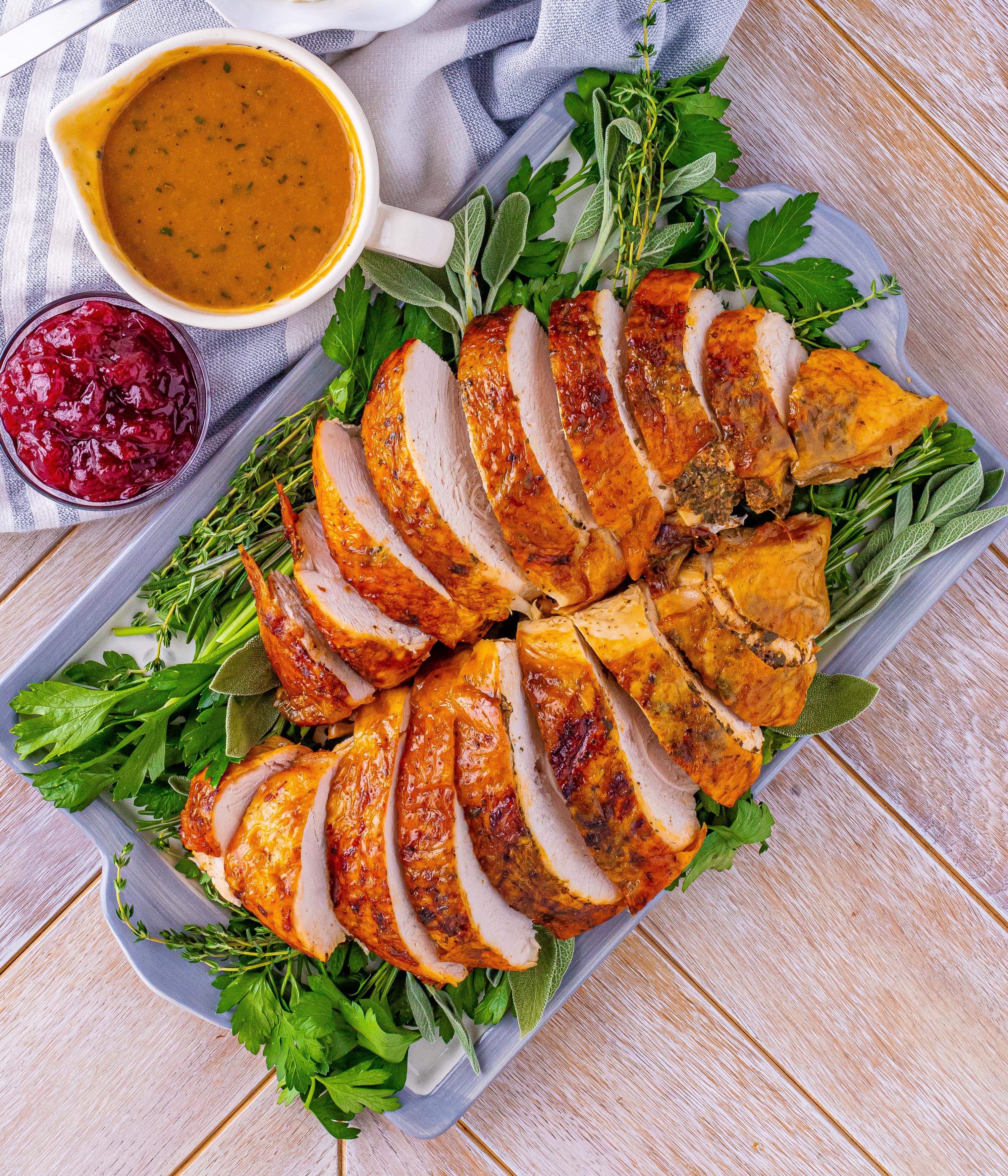 Sliced turkey breast on a large platter.
