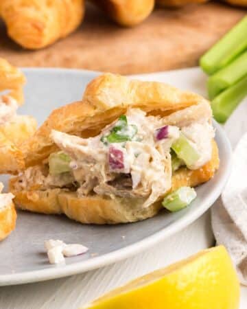 Chicken salad on a sliced croissant,