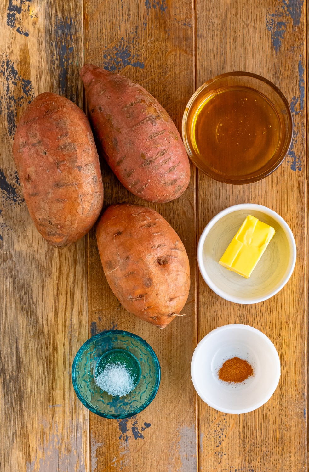 Ingredients needed to make this recipe measure in prep bowls on a large cutting board. 