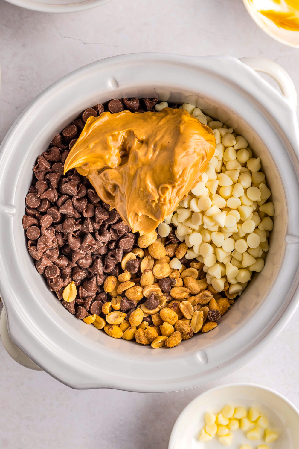Ingredients needed for making this candy inside a crock pot. 