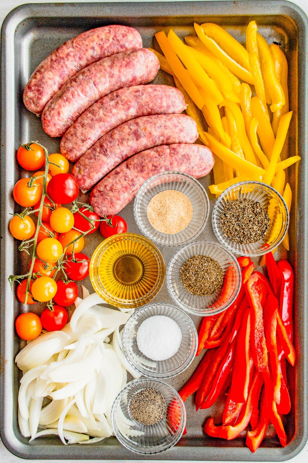 Ingredients needed to make this recipe presented on a sheet pan.